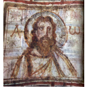 Les lettres grecques alpha et oméga entourent l´halo de Christ.