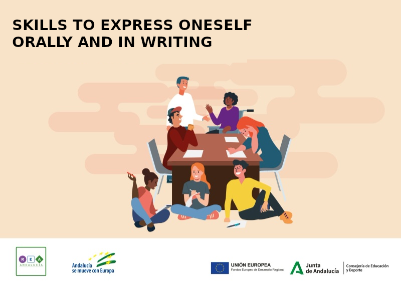 Group of kids next to a table writing texts.