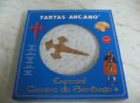 Tarta en un envase que recoge sus especificaciones.