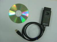 Disco y conector para diagnosis en vehículo de gupo Opel con portátil.