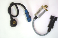 Imagen de dos sensores piezoeléctricos empleados en automoción.