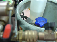 Bombona y espita de salida de gas.