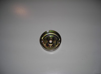 En la fotografía podemos ver la tapa soporte del lado de las escobills de un motor de arranque.