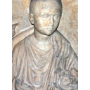 Detail from a relief showing a Roman boy wearing a bulla.